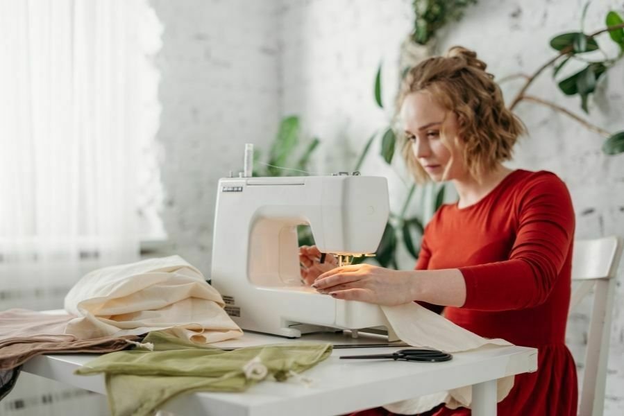 Executive dysfunction - A young woman sewing with a sewing machine